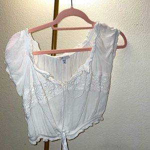 Selling a super cute, barely worn, off the shoulder white shirt!